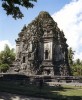 Sari Chandi, in Prambanan. Erected in the early 9th C, this monument has three connected sanctuaries and two storeys. Its outer walls are highly decorated with windows and images of deities.